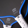 paddle handle cropped off of body helix FLiK F1 Standard pickleball paddle on black
