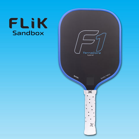 Pickleball paddle with F1 branding on a blue background, featuring the brand 'Flik Sandbox'.