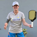 woman with X4 Kevlar Pickleball Paddle