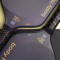 picture of 2 body helix C4 carbon pickleball paddles